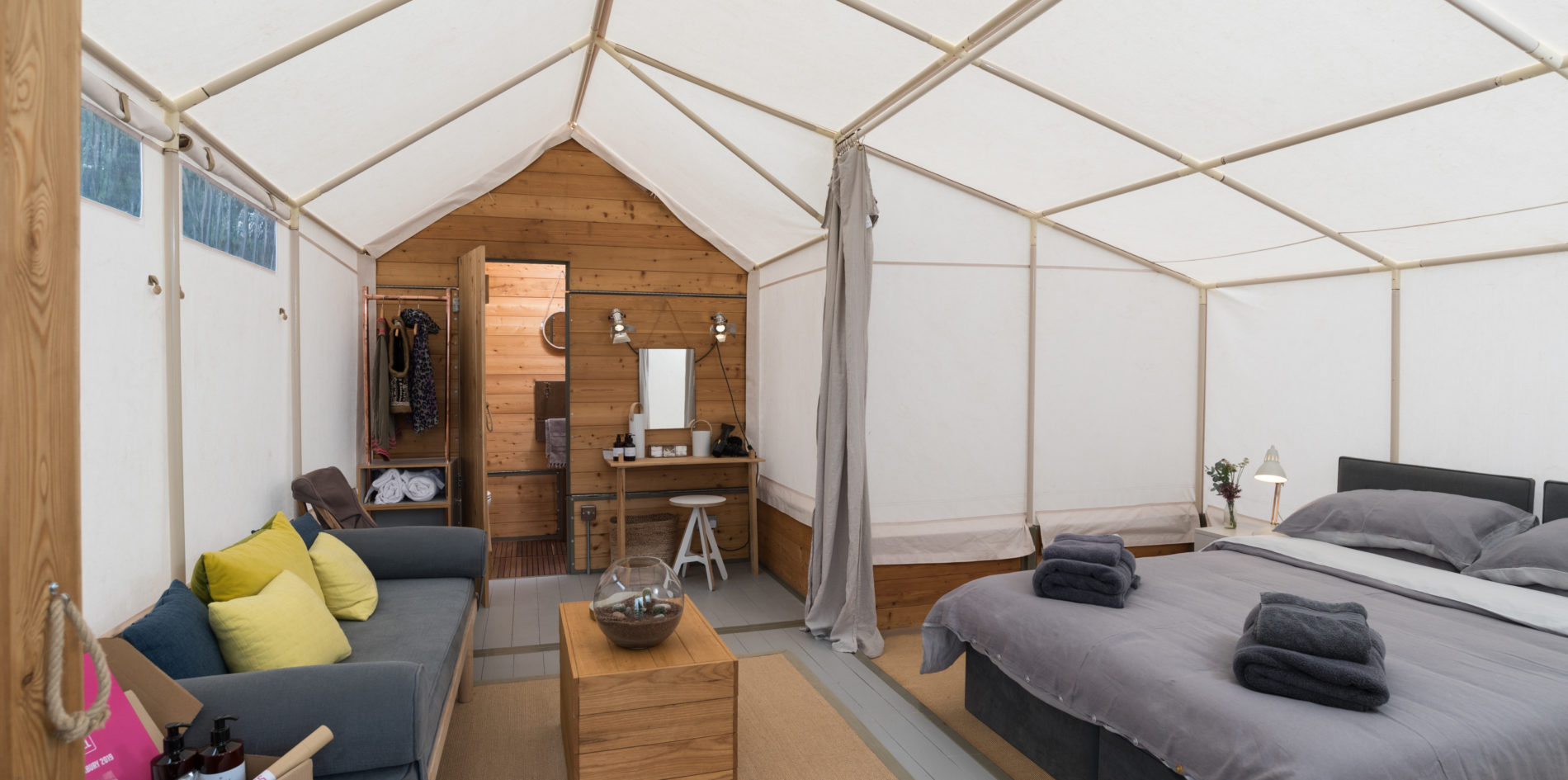 bed and living area details - luxury suite luxury camping accommodation