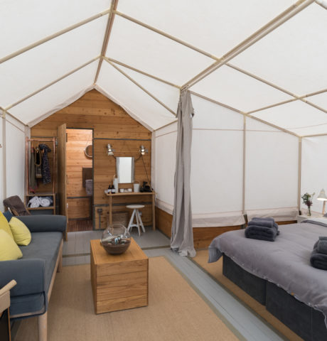 bed and living area details - luxury suite luxury camping accommodation